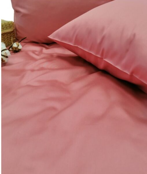 Solid color satin bedsheet in soft tea rose